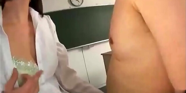 Horny Milf Teacher Teases And Sucks Her 2 Teenage Students' Cocks Inside The Classroom