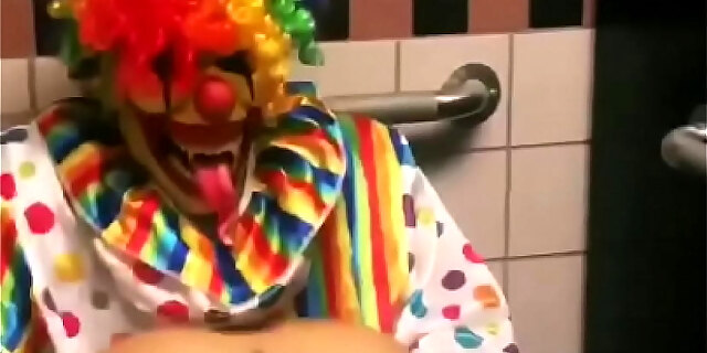 Girl Rides Clown In Bathroom Stall